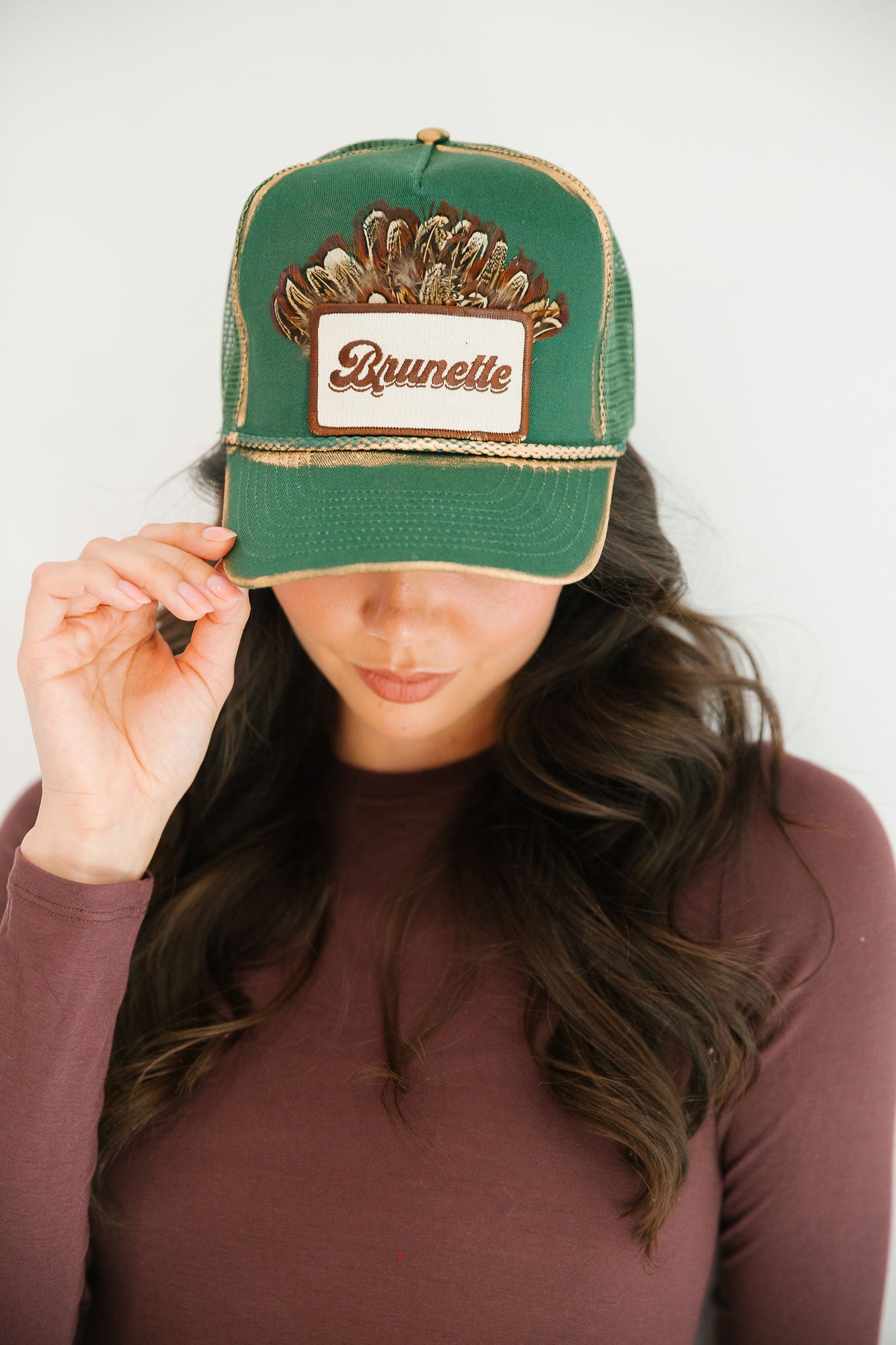 BRUNETTE FEATHER GREEN STRUCTURED HAT TRUCKER HAT Judith March
