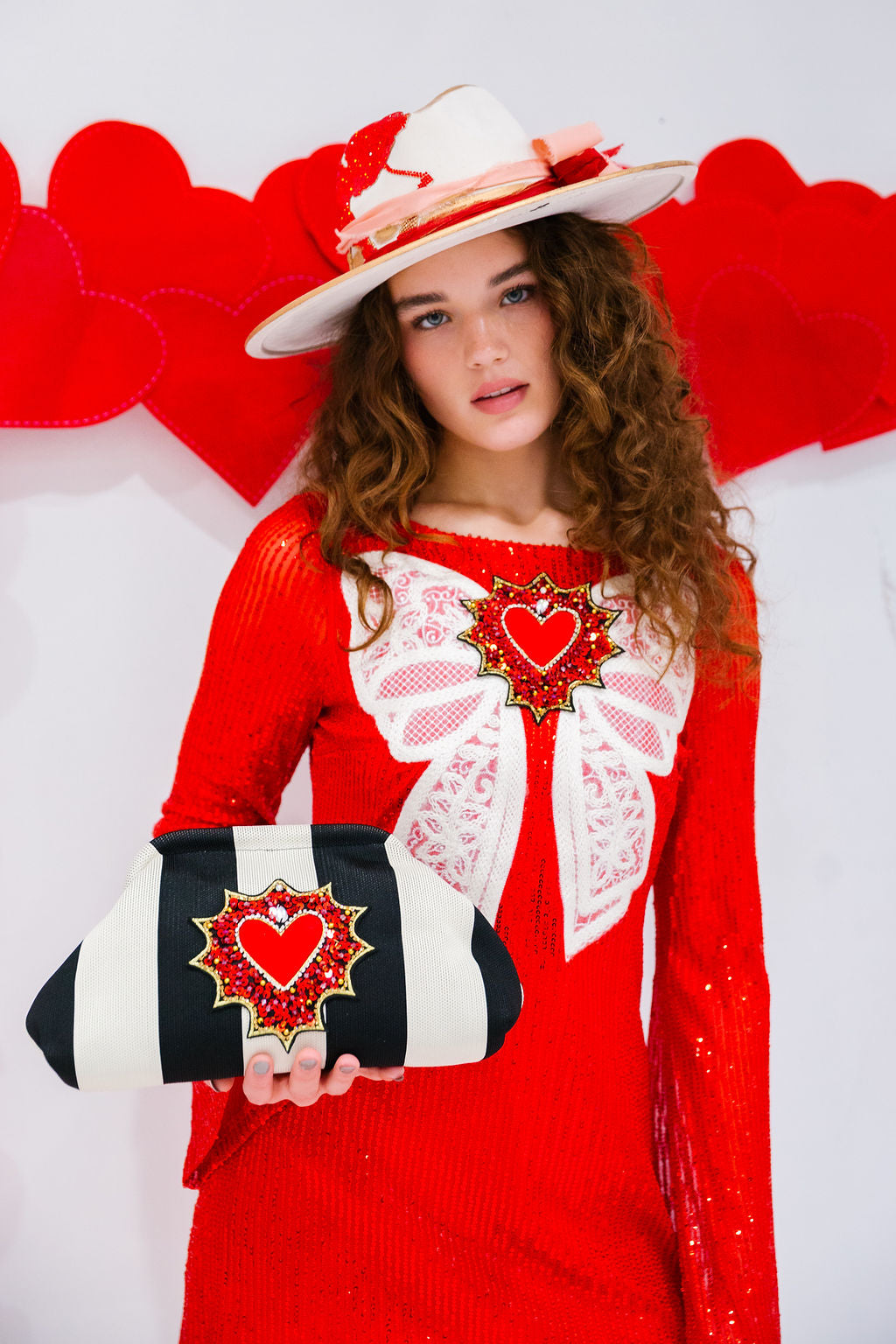 LOVE STORY STRIPED CLUTCH PURSE Judith March