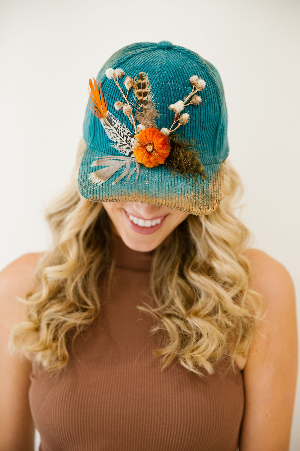 PUMPKIN & PLUMES CORDUROY TRUCKER HAT