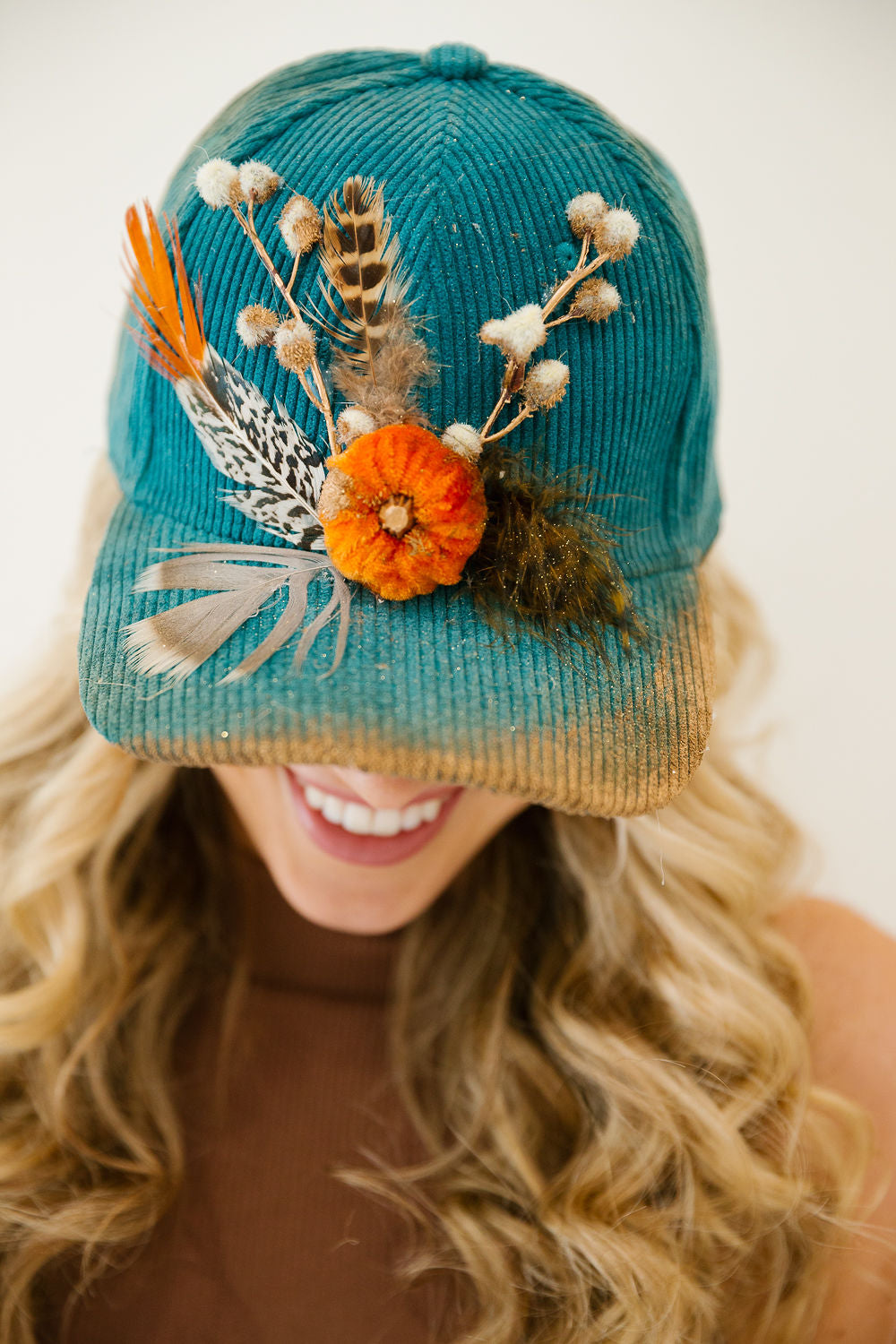 PUMPKIN & PLUMES CORDUROY TRUCKER HAT