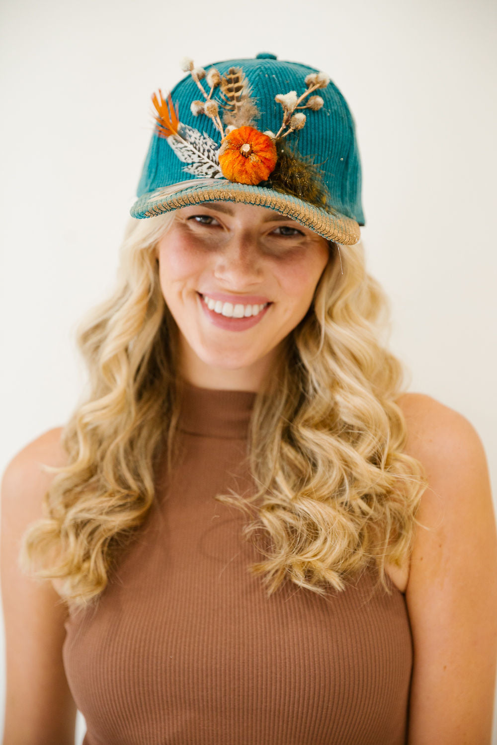 PUMPKIN & PLUMES CORDUROY TRUCKER HAT