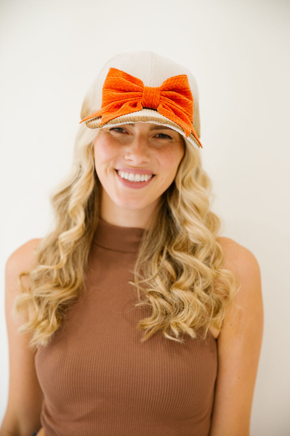 AUTUMN BLISS BOW CORDUROY TRUCKER HAT