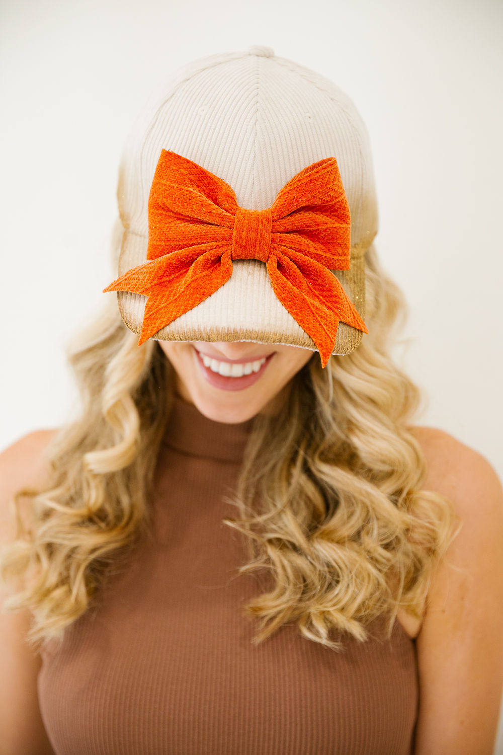 AUTUMN BLISS BOW CORDUROY TRUCKER HAT