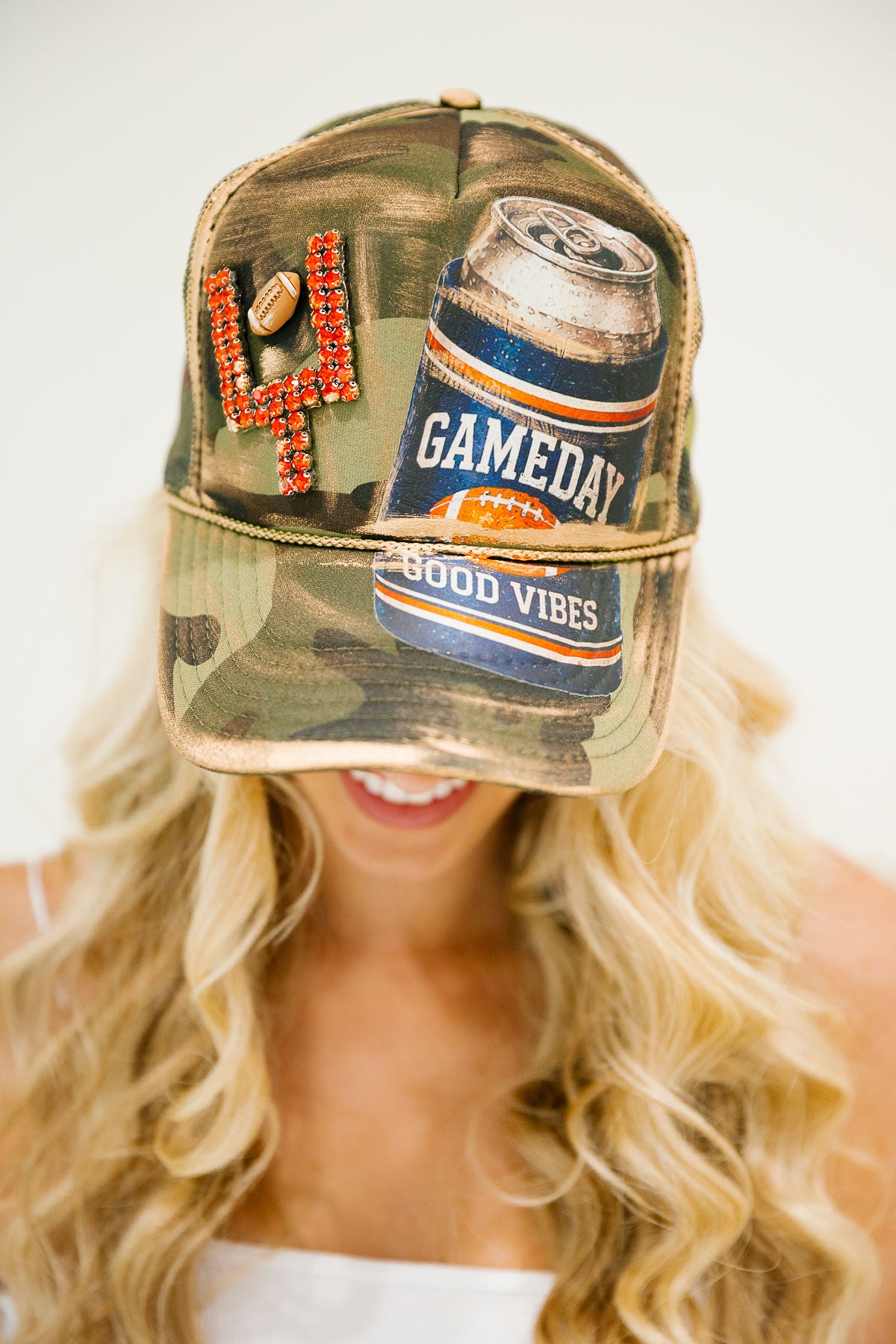 GAMEDAY GOOD VIBES CAMO TRUCKER HAT