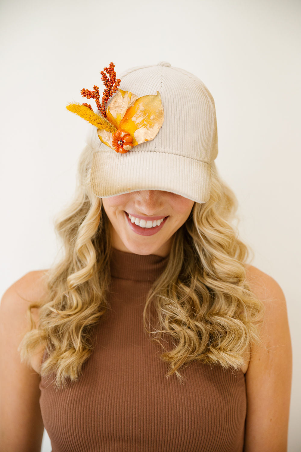 THE PUMPKIN PETAL CORDUROY TRUCKER HAT