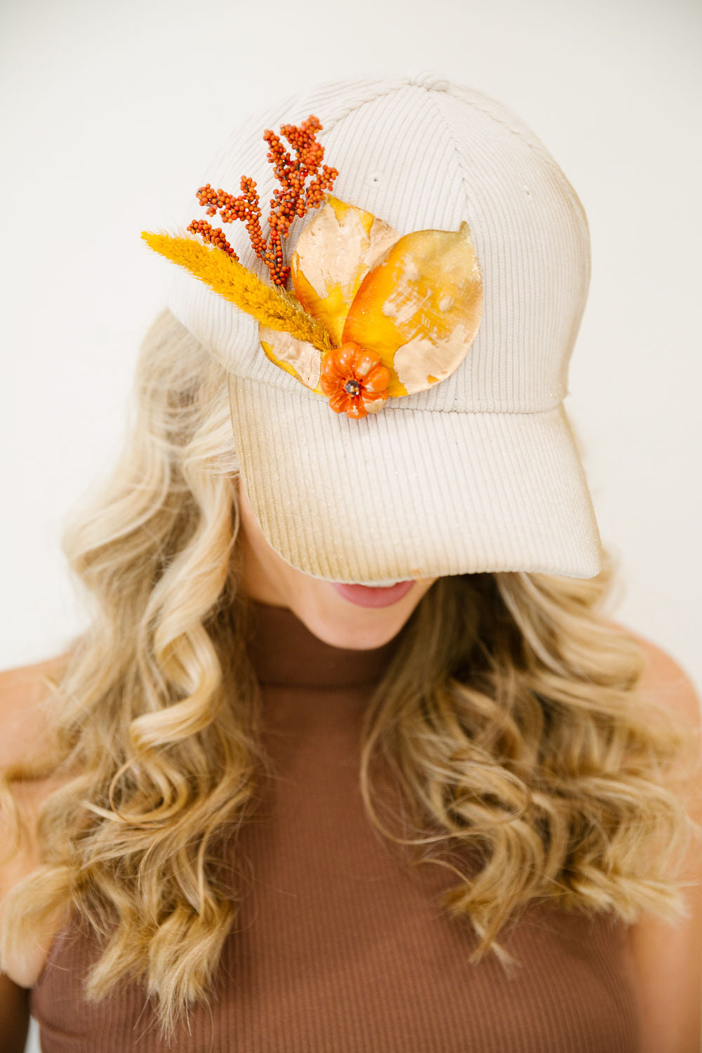 THE PUMPKIN PETAL CORDUROY TRUCKER HAT