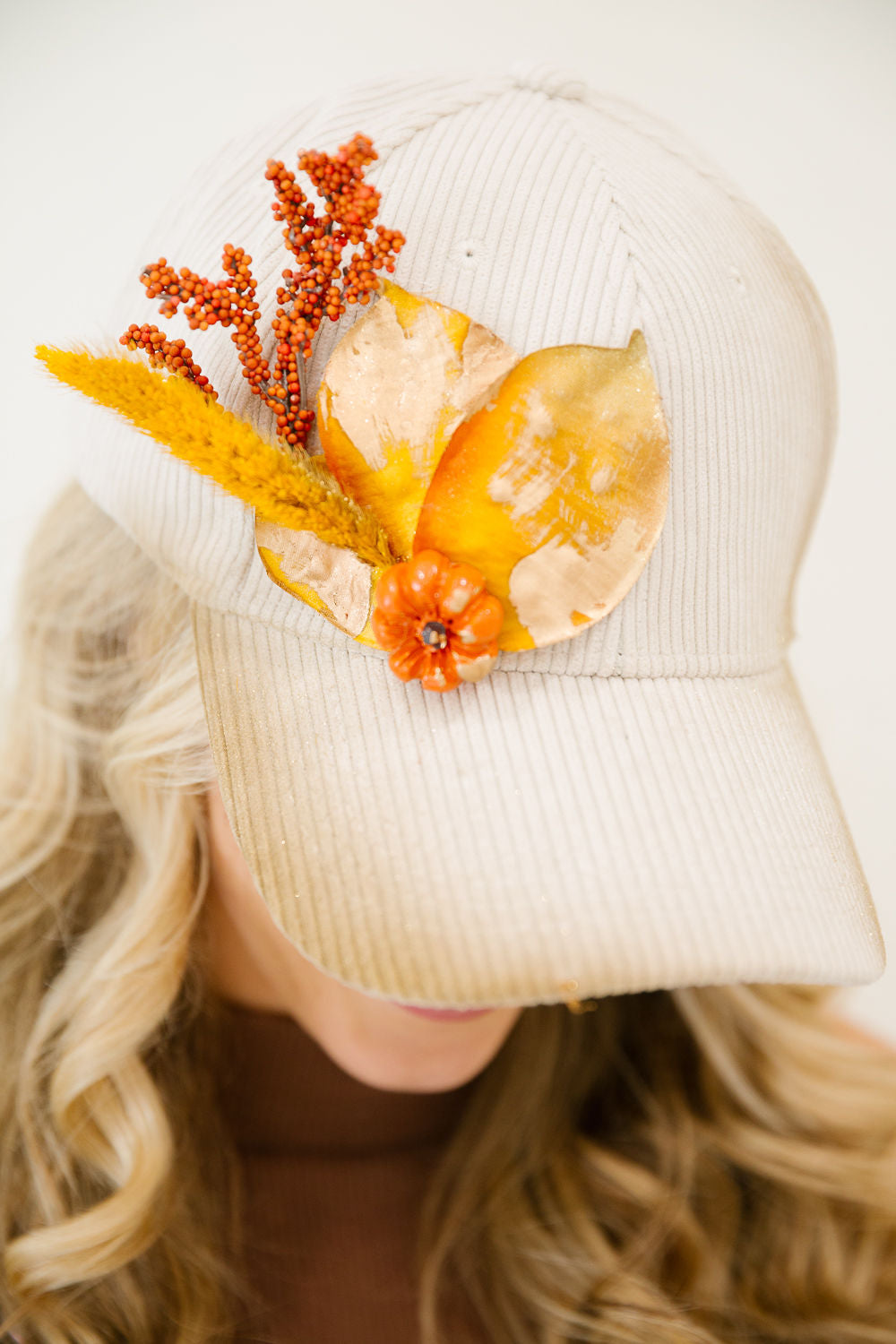 THE PUMPKIN PETAL CORDUROY TRUCKER HAT