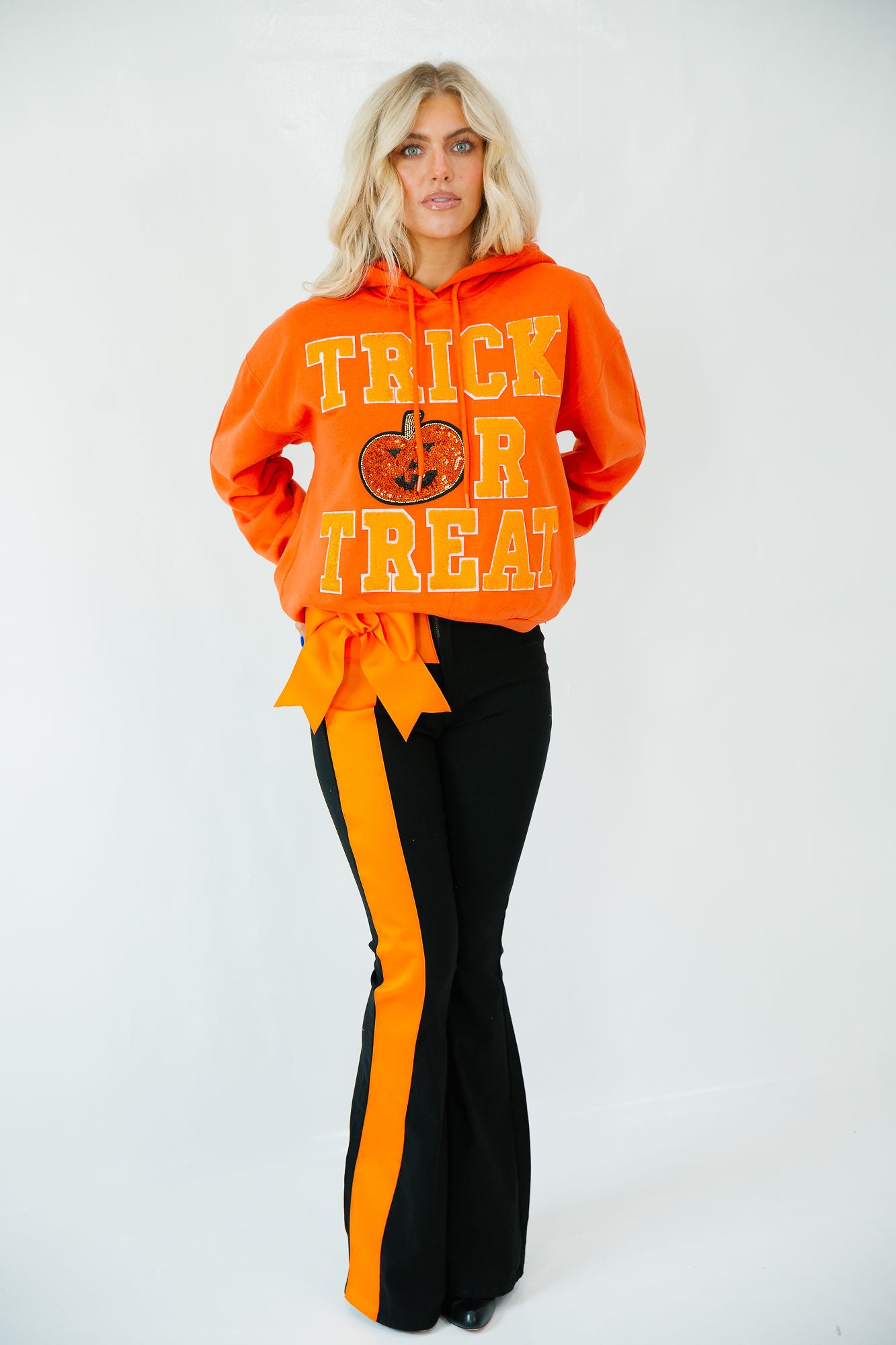 TRICK OR TREAT ORANGE VARSITY HOODIE HOODIE Judith March