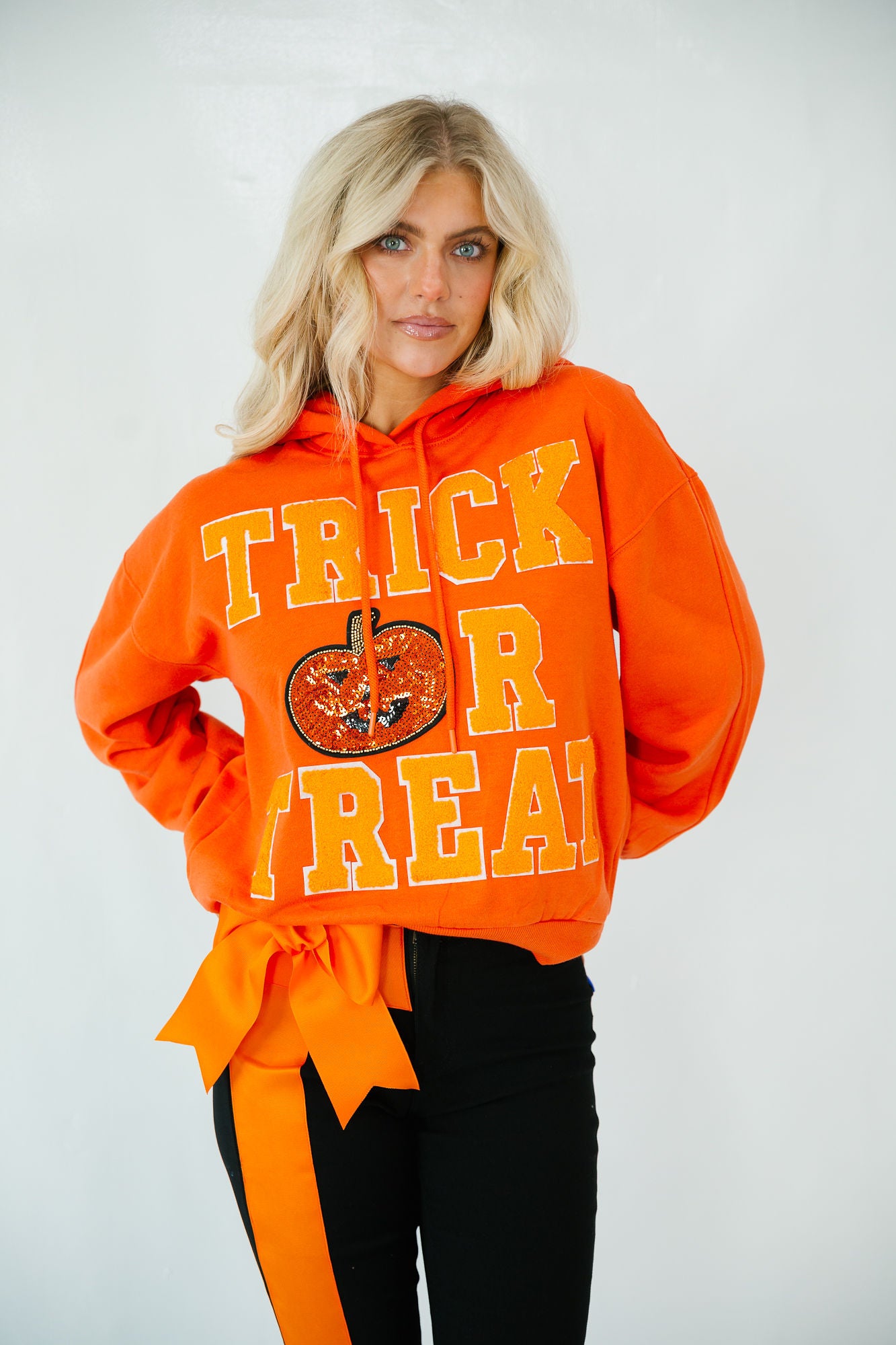 TRICK OR TREAT ORANGE VARSITY HOODIE HOODIE Judith March