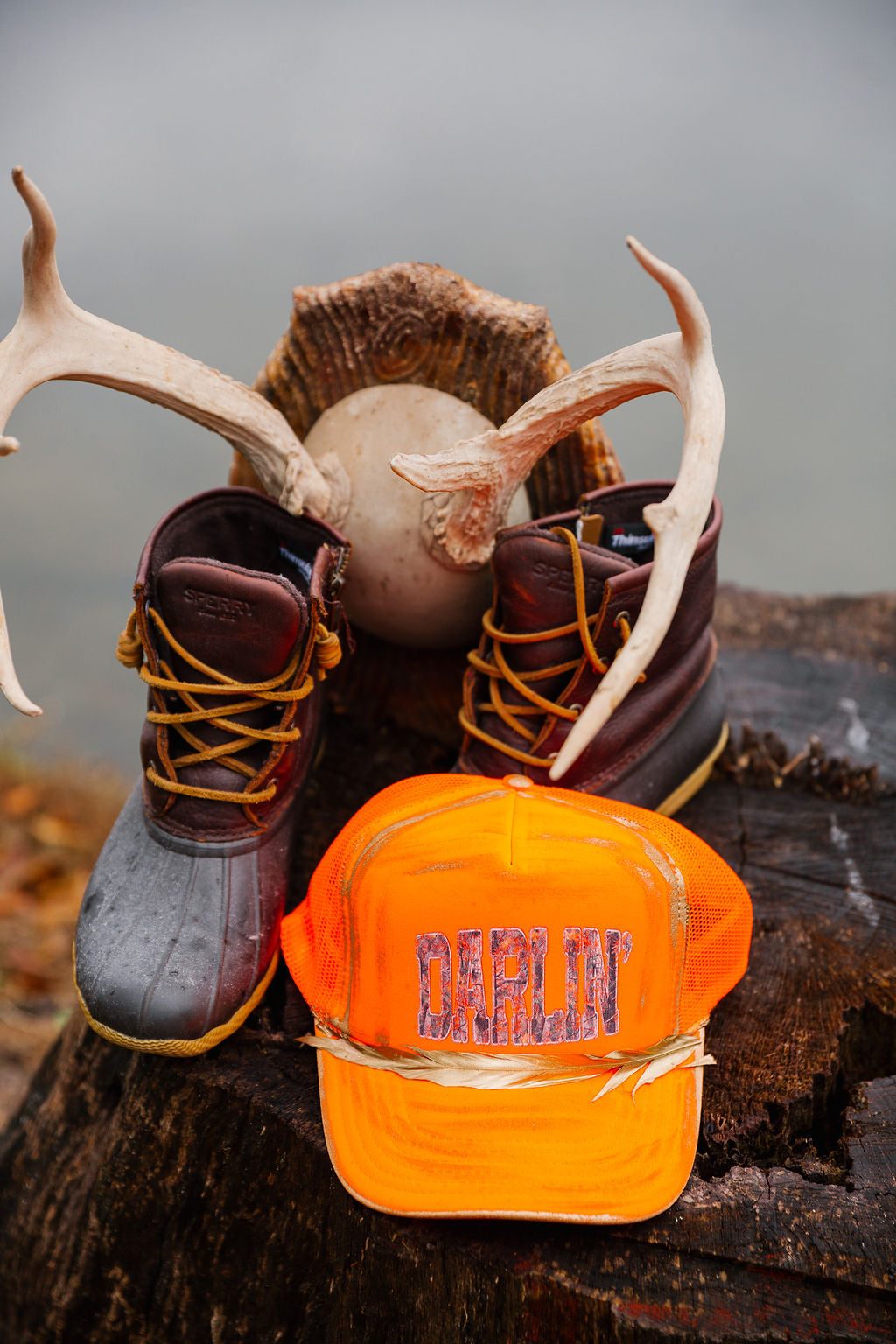 DARLIN' ORANGE TRUCKER HAT HAT Judith March