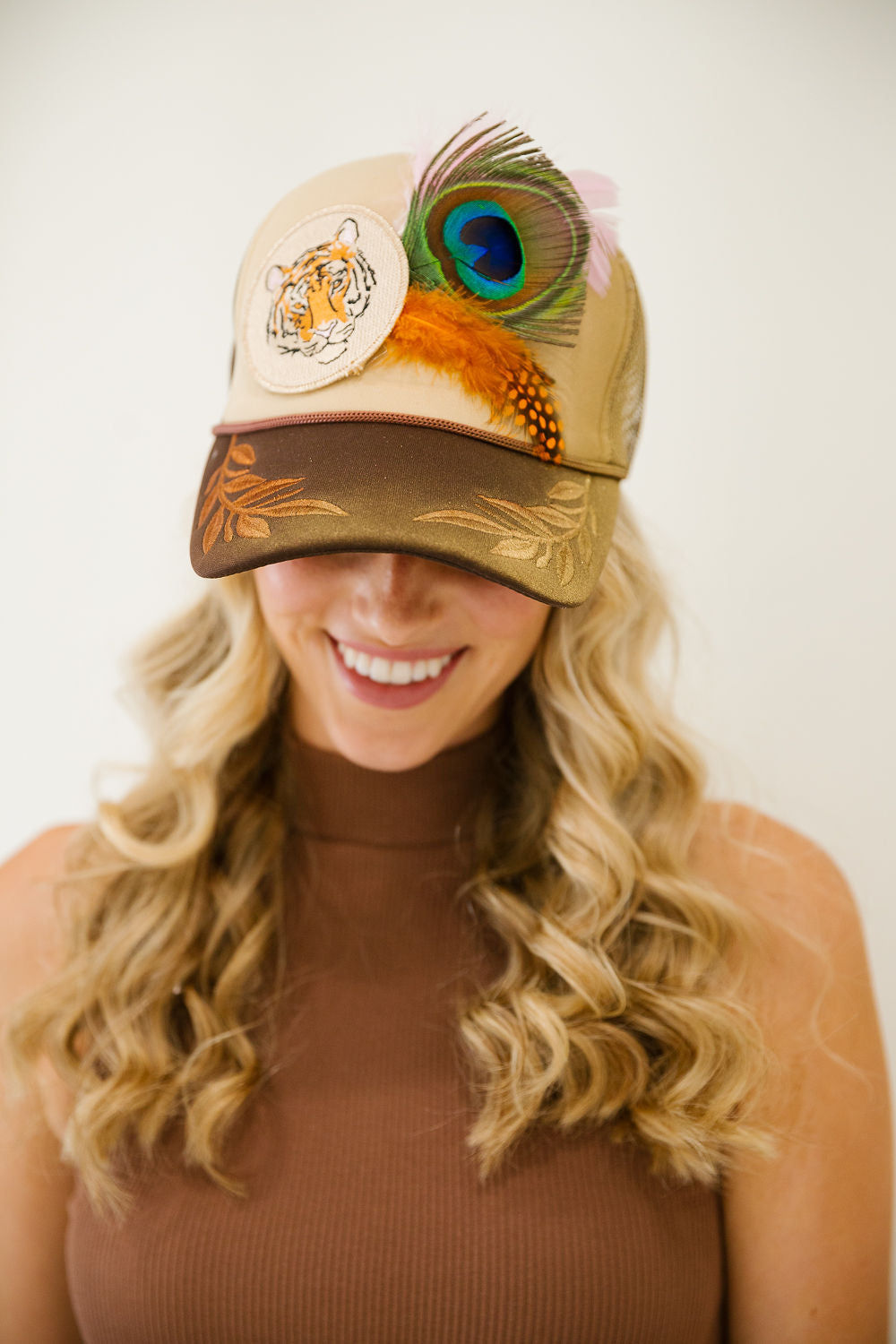 THE PEACOCK PROWL TRUCKER HAT TRUCKER HAT Judith March
