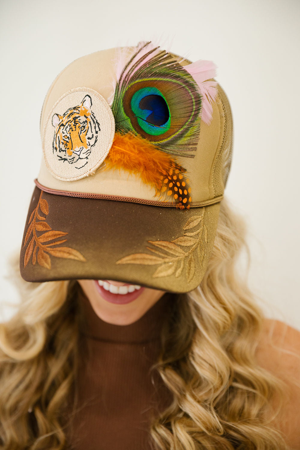 THE PEACOCK PROWL TRUCKER HAT TRUCKER HAT Judith March