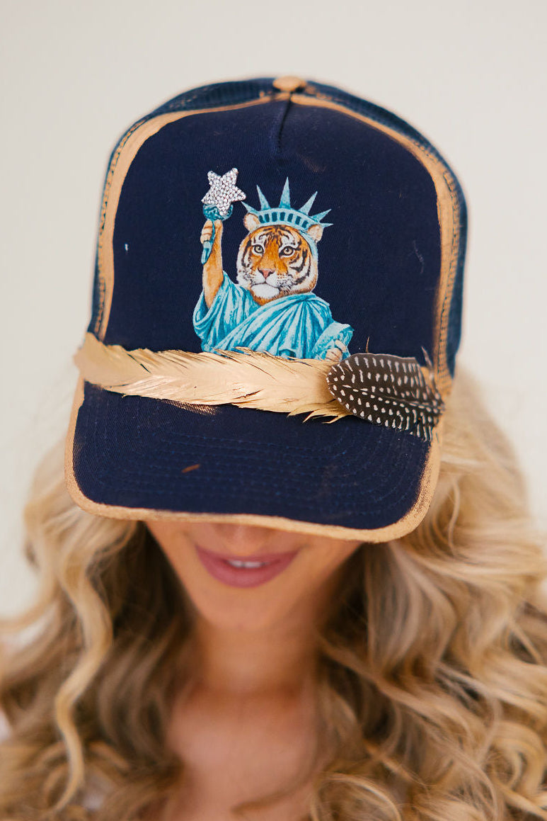 TIGER LIBERTY NAVY TRUCKER HAT HAT Judith March
