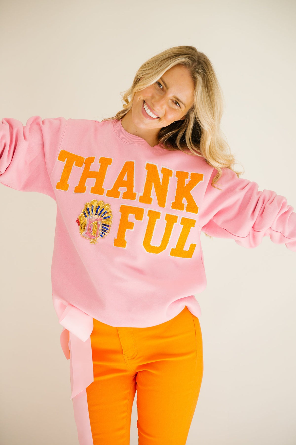 PRETTY PINK BOW ORANGE FLARES FLARES Judith March