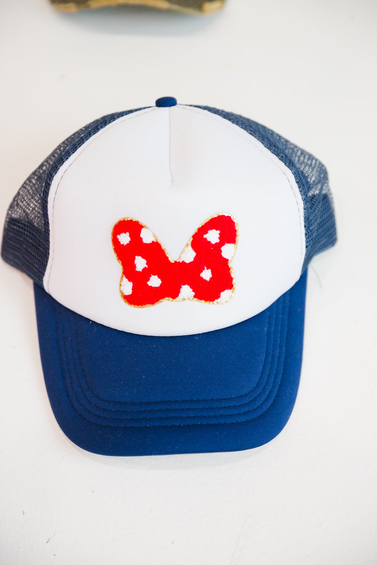 *BOW PATCH NAVY TRUCKER HAT HAT Judith March