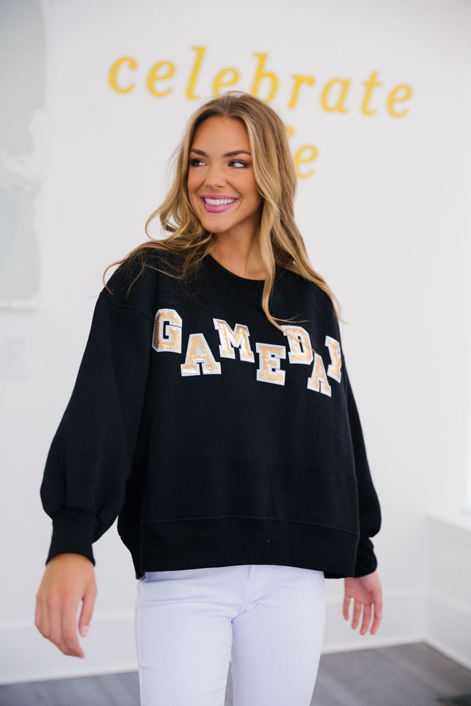 Black cropped pullover with Gameday in gold sequin letters
