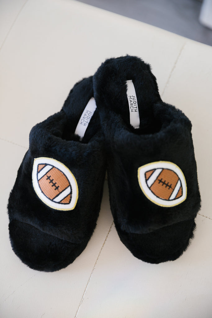 Black fuzzy open toe slippers with football patches