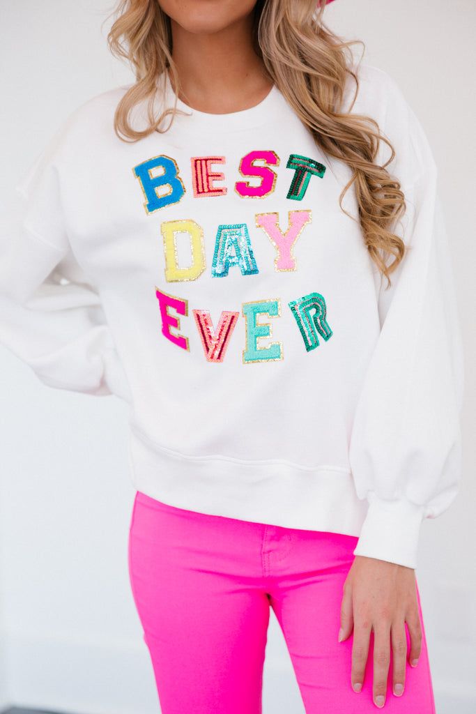 White cropped pullover with colorful or sequin "Best Day Ever" letters