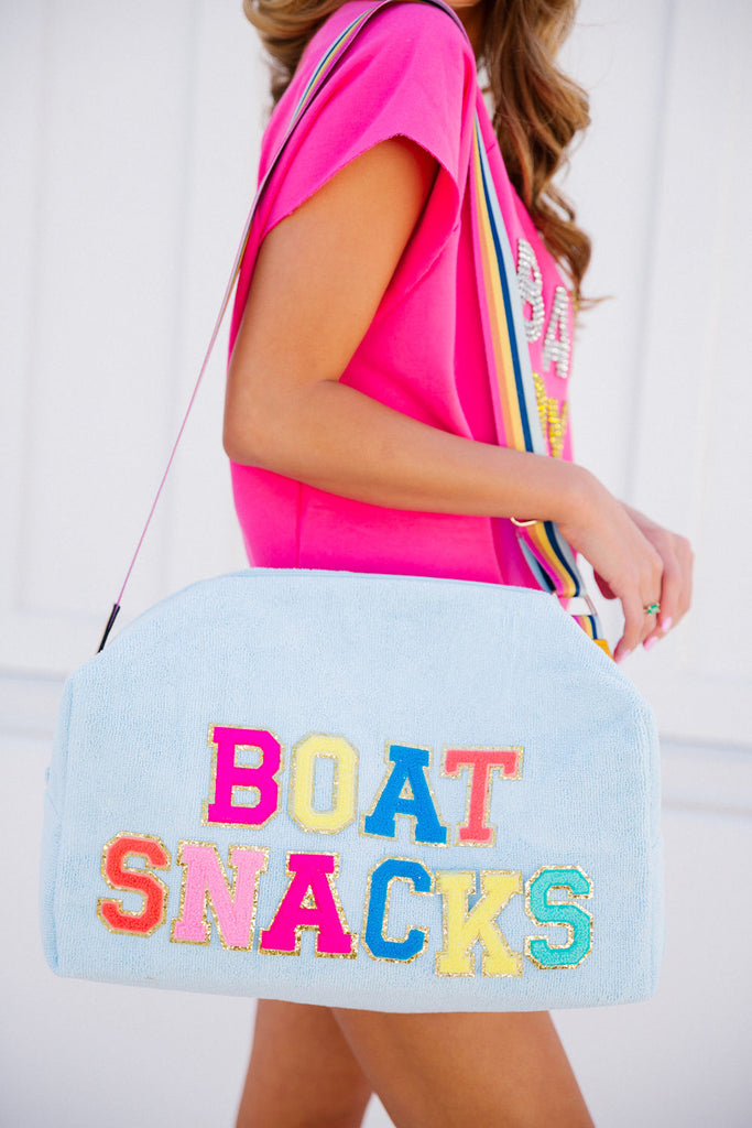 Blue large terry bag with Boat Snacks in alternating rainbow terry letters