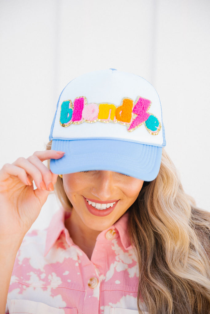 White and blue trucker hat with Blondie patch
