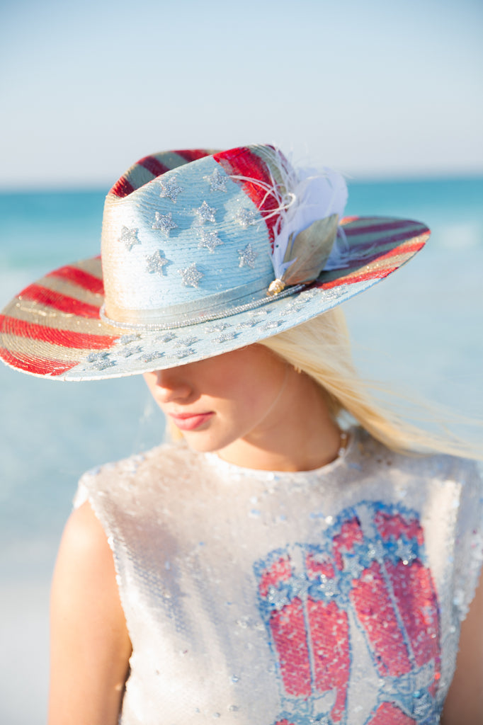 American flag rancher style hat with silver stars and feathers