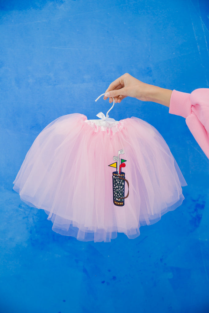 Pink tutu with golf bag patch. 