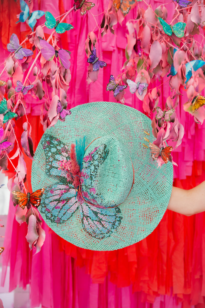 Teal sun hat with sequin butterfly and flowered band