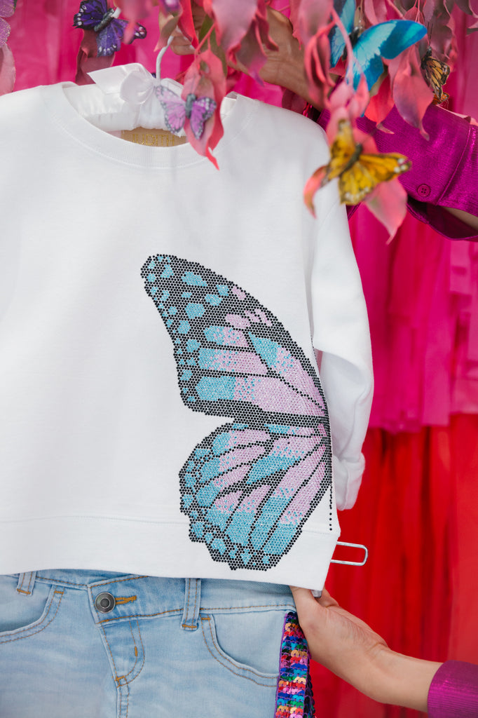 White pullover with sequin butterfly