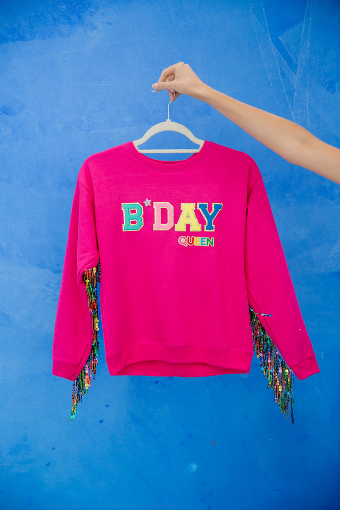 Kids pink pullover with "bday queen" patch and multi colored sequin fringe. 