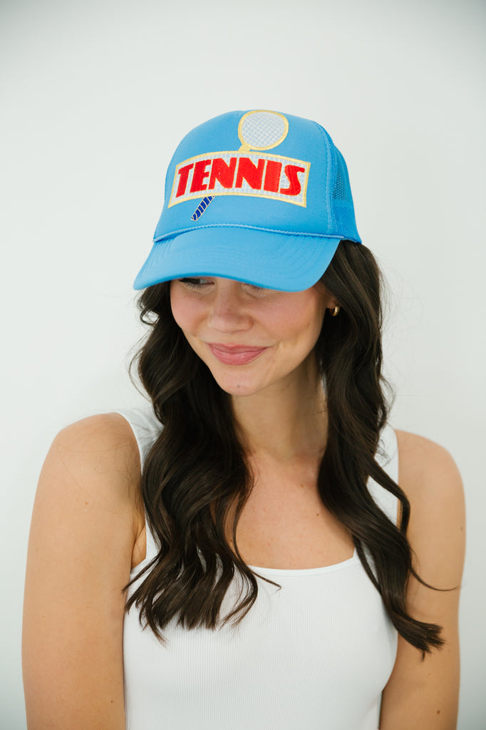 Blue trucker hat with the tiebreaker tennis patch. 
