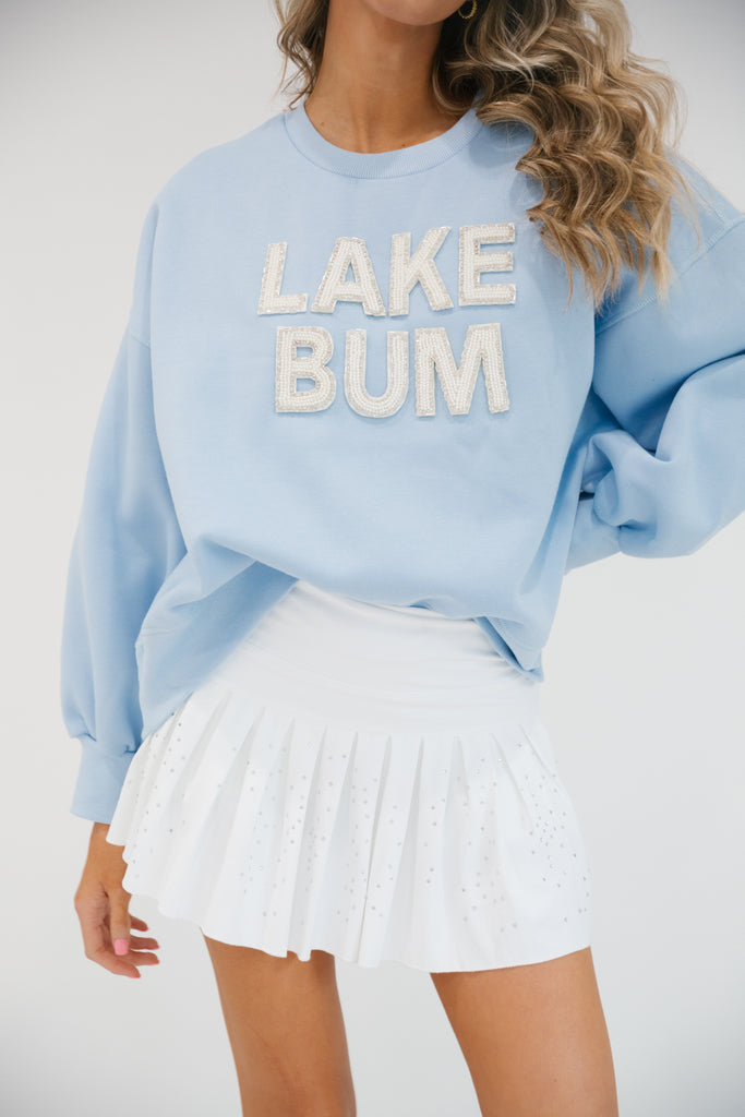 Blue cropped pullover with Lake Bum in white beaded letters