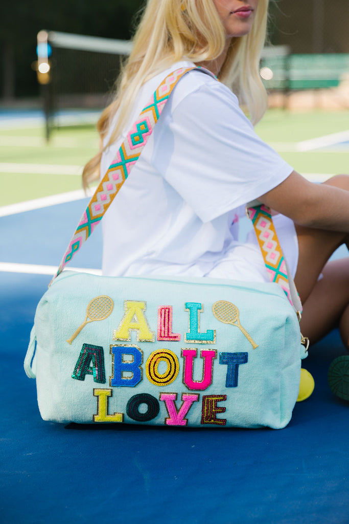 Mint large terry bag with All About Love in rainbow terry and sequin letters with gold tennis rackets