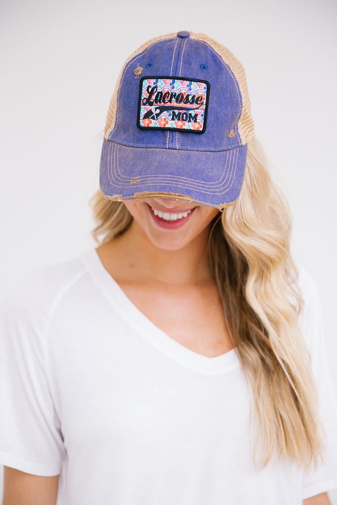 Denin distressed hat with "lacrosse mom" patch. 