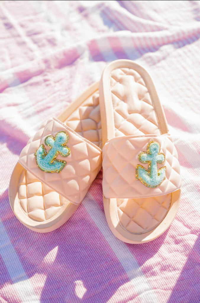 Cream slides with blue anchor patches
