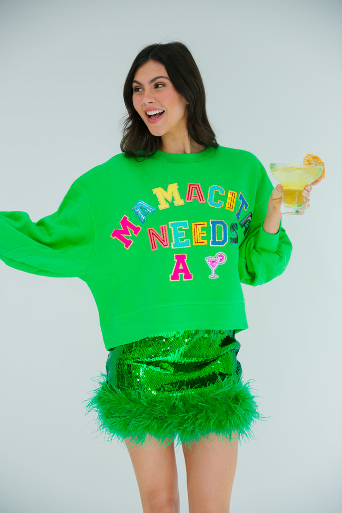 Green cropped pullover with Mamacita Needs A Margarita in colorful terry letters, sequin letters, and a margarita patch