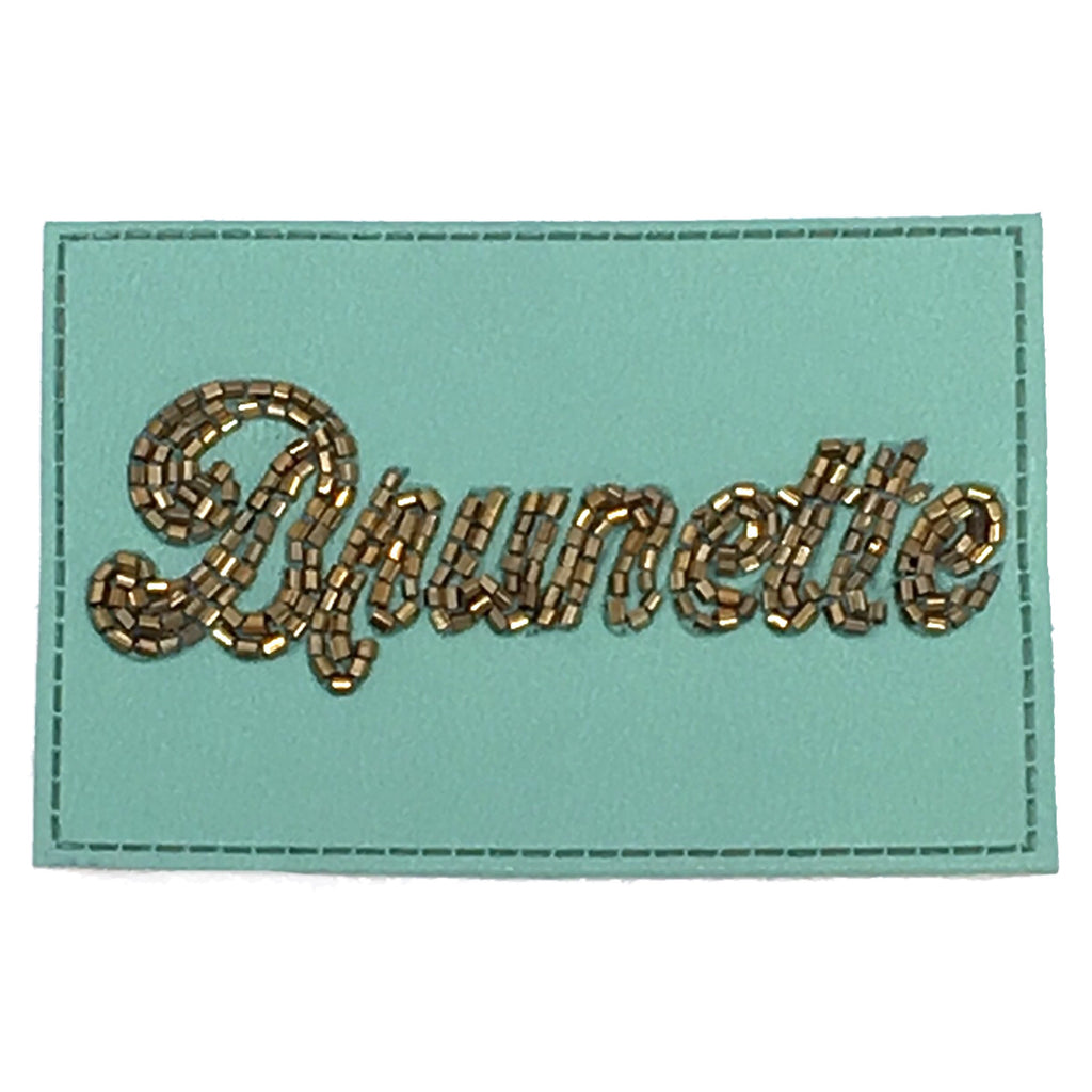TURQUOISE BEADED LEATHER BRUNETTE PATCH HAT